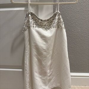 White Top with Silver Embellishments